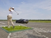 Coulthard and Shepherd Set Record World's Farthest Golf Shot Caught in Moving Car