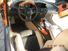Bright Orange BMW M6 with scissor doors