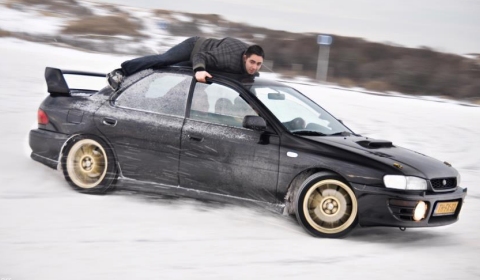 Video Crazy Guy on Roof of Snow Drifting Subaru