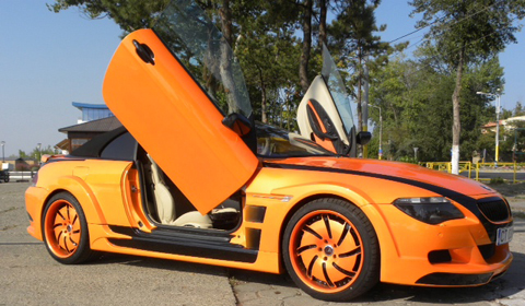 Overkill: Bright Orange BMW M6 with scissor doors