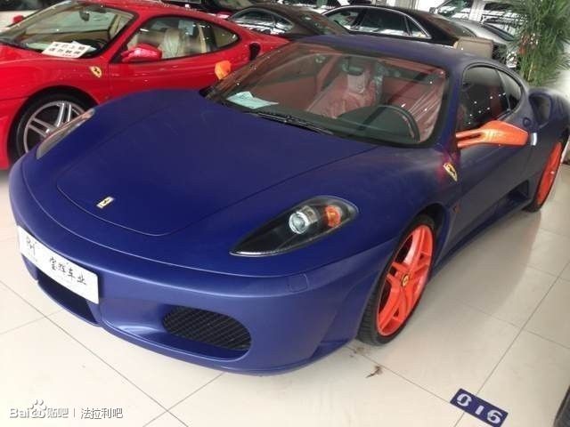 Overkill: Matte Blue Ferrari F430 With Fluro Orange Wheels