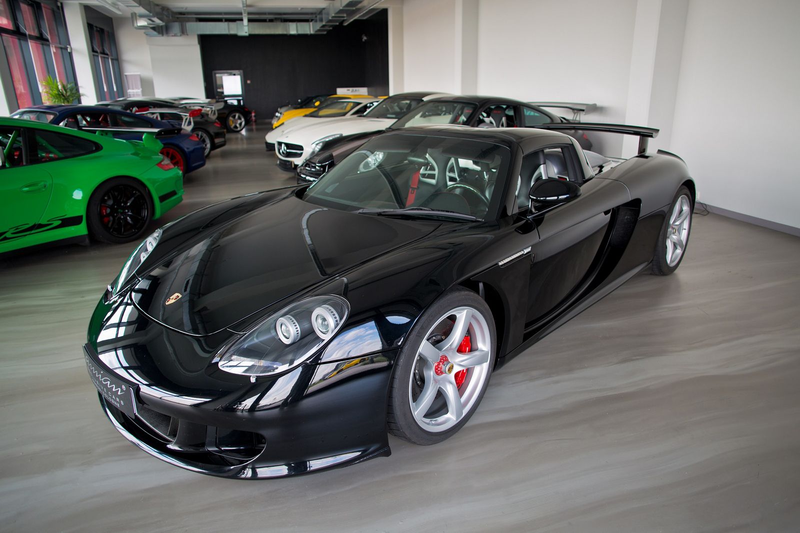 Striking Black Porsche Carrera GT For Sale - GTspirit